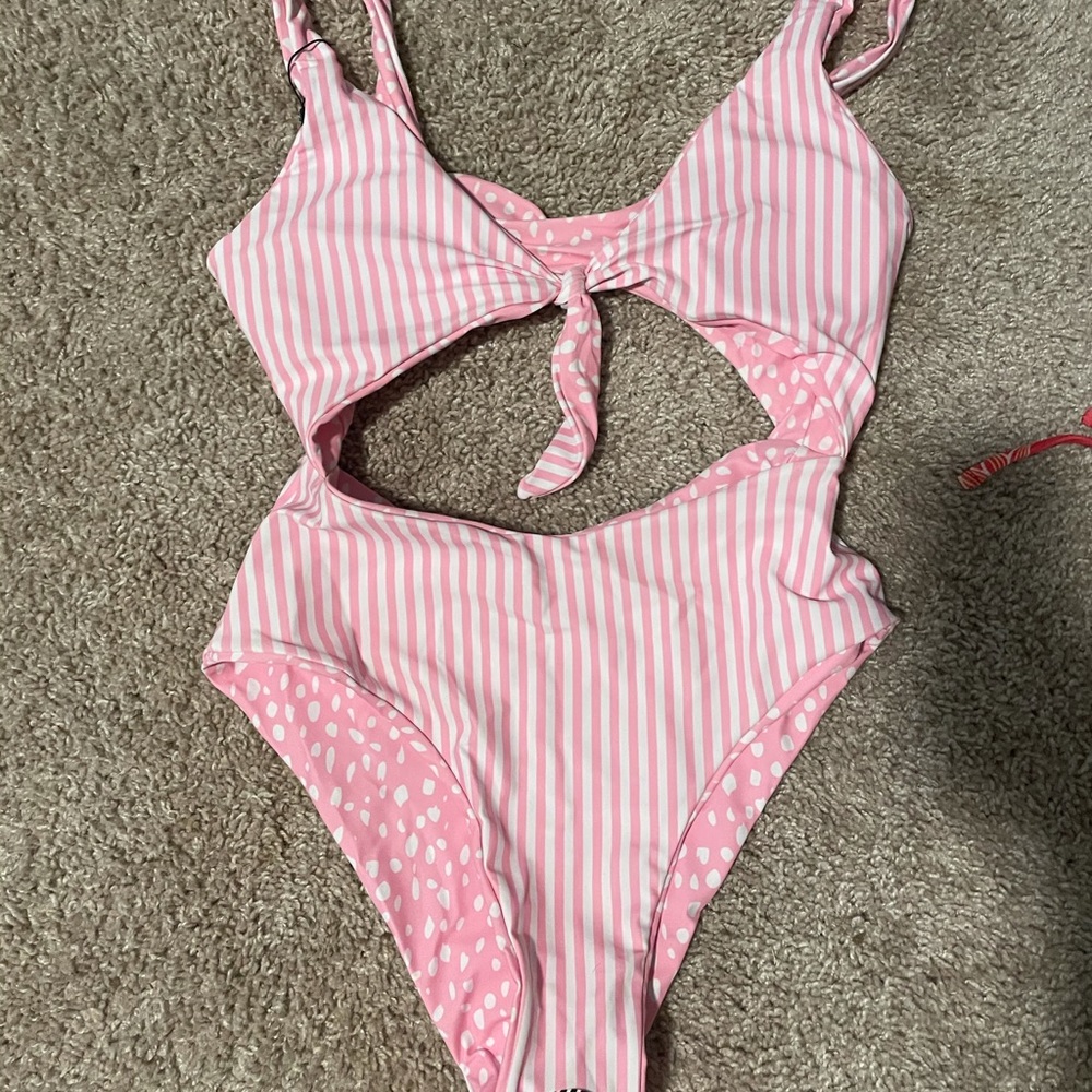 Size small reversible one piece